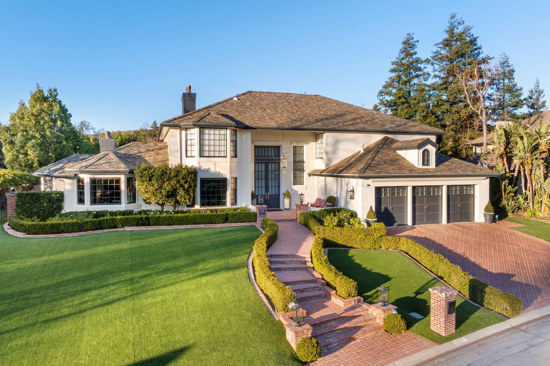 Luxury estate with manicured lawn